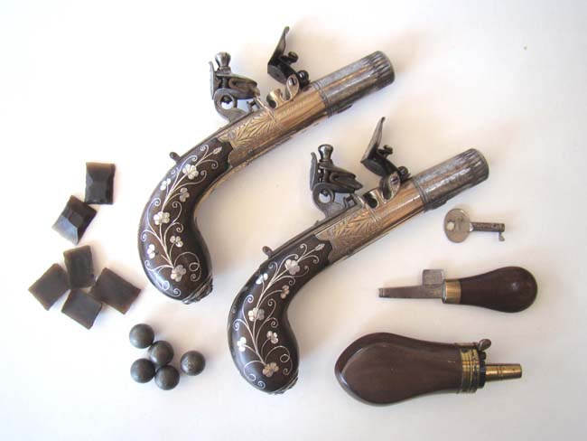 A Cased pair of Antique silver mounted Flintlock Pocket Pistols by James Collins, London, circa 1825-1832 — image 6